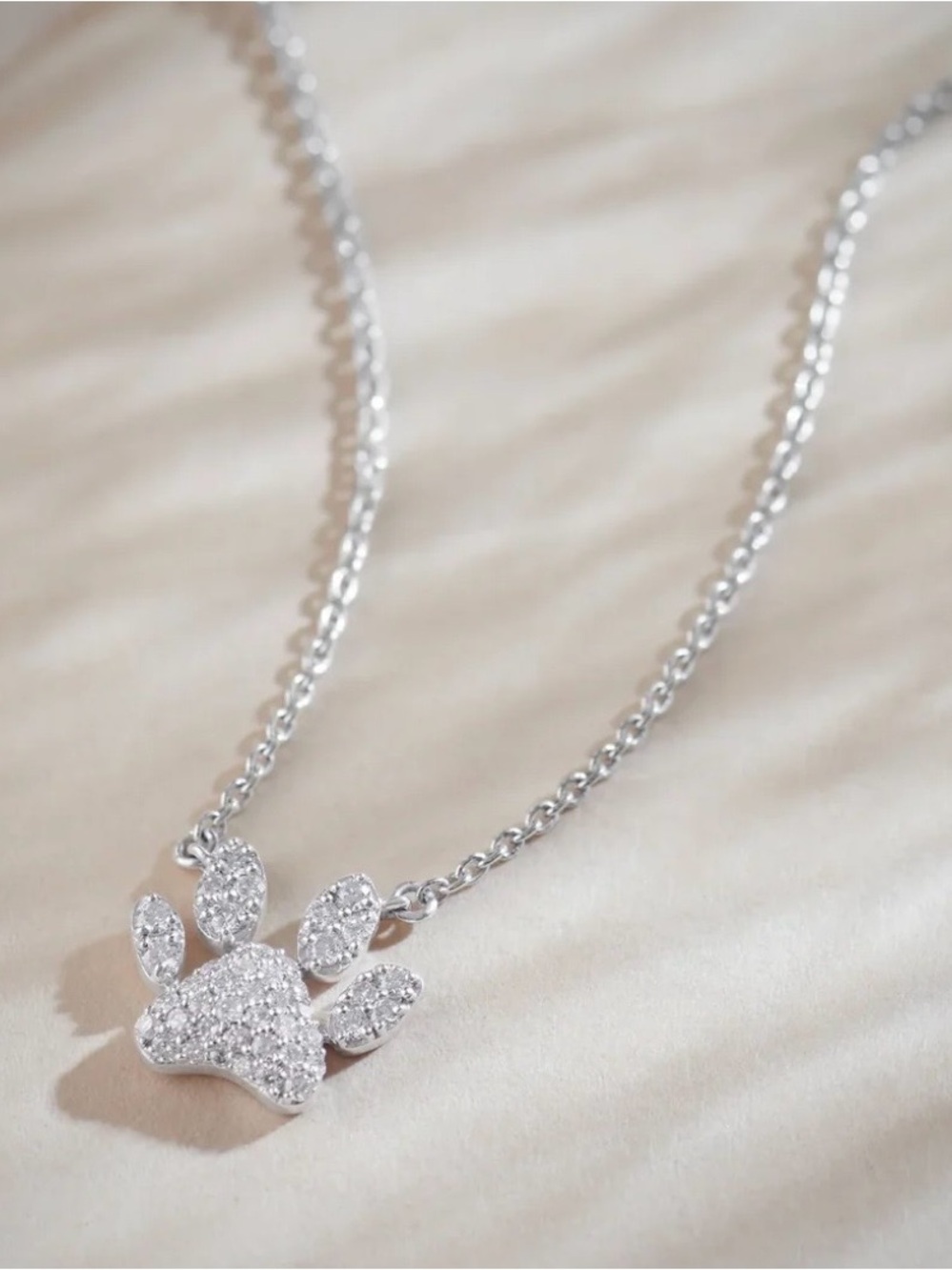 Diamond Paw necklace. Sterling silver with beautiful 1/4 kt lab grown diamonds.